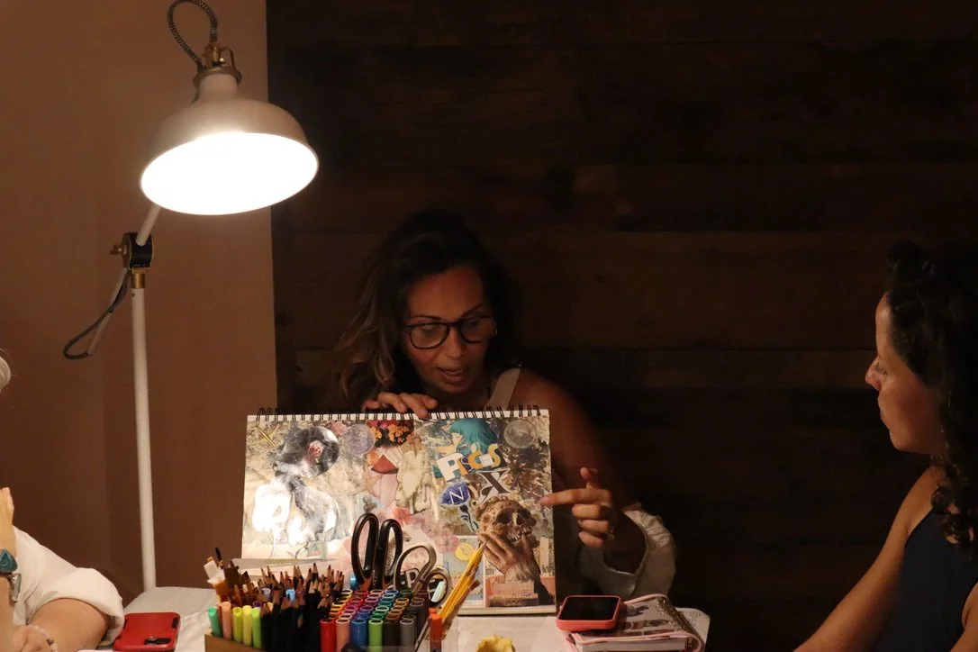 A workshop table under a lamp